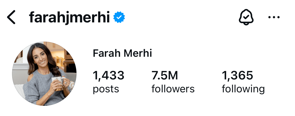 Instagram profile photo of Farah Merhi, smiling and holding a mug, reflecting her approachable interior design and lifestyle brand.