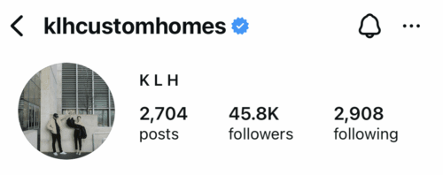 Instagram profile photo of KLH Custom Homes — two people posing in front of a modern building, representing the firm’s contemporary residential design.